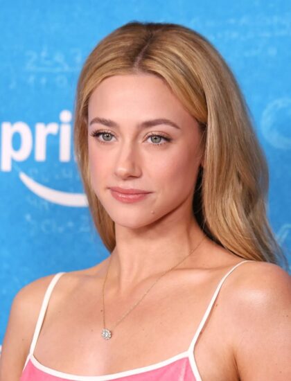 Lili Reinhart smiling softly for the cameras at The Love Hypothesis Los Angeles screening
