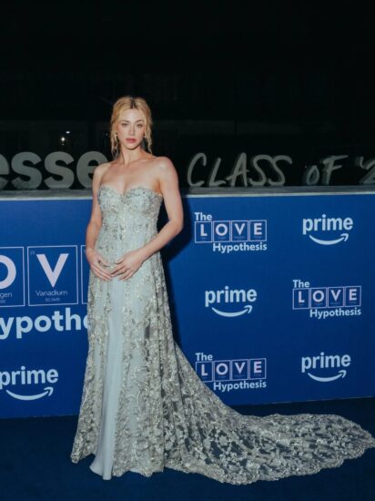 Lili Reinhart dazzling in a silver lace gown with a sweeping train on The Love Hypothesis press tour