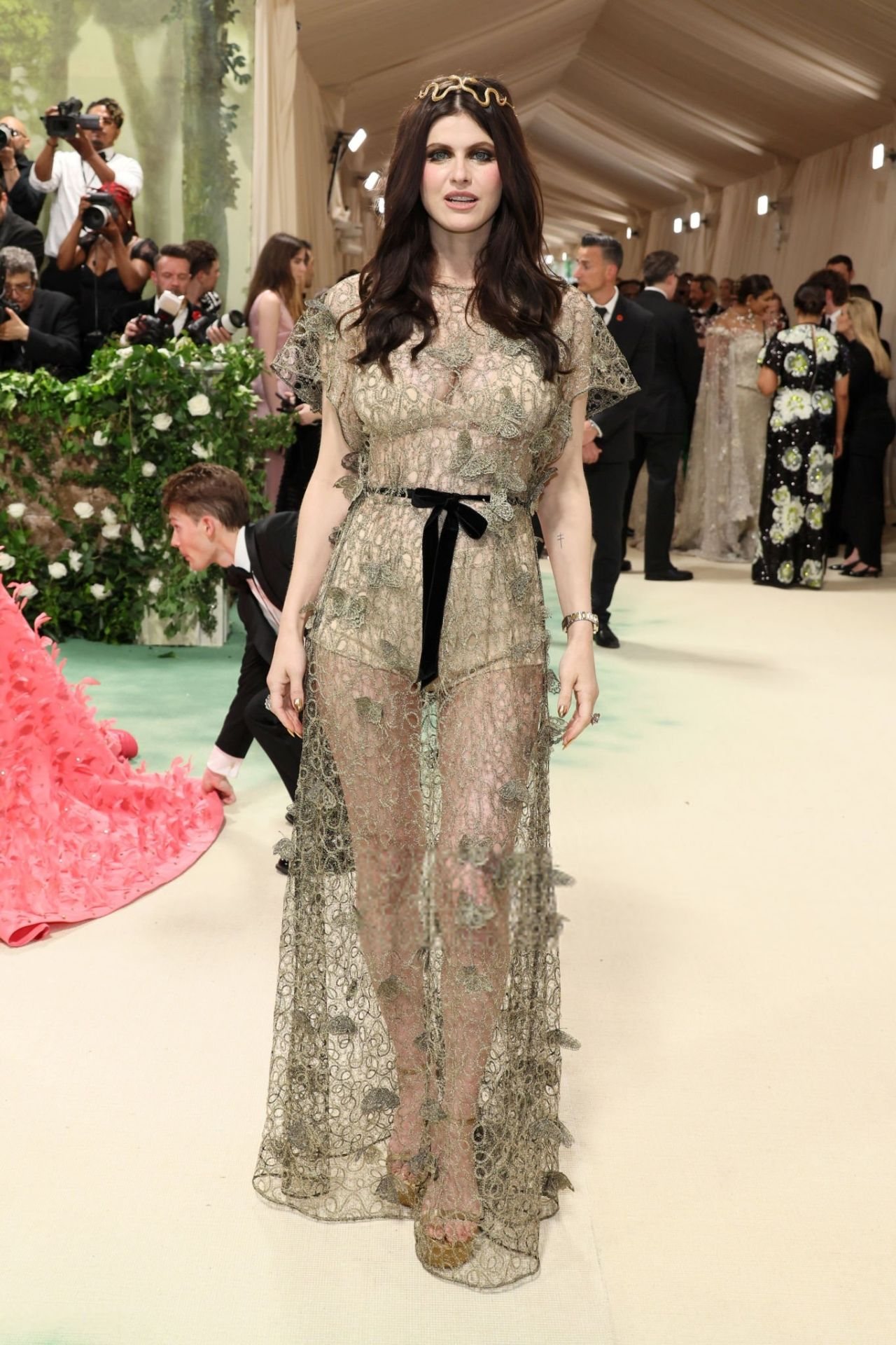 Alexandra Daddario full length on the Met stairs in the sheer gold gown and snake crown