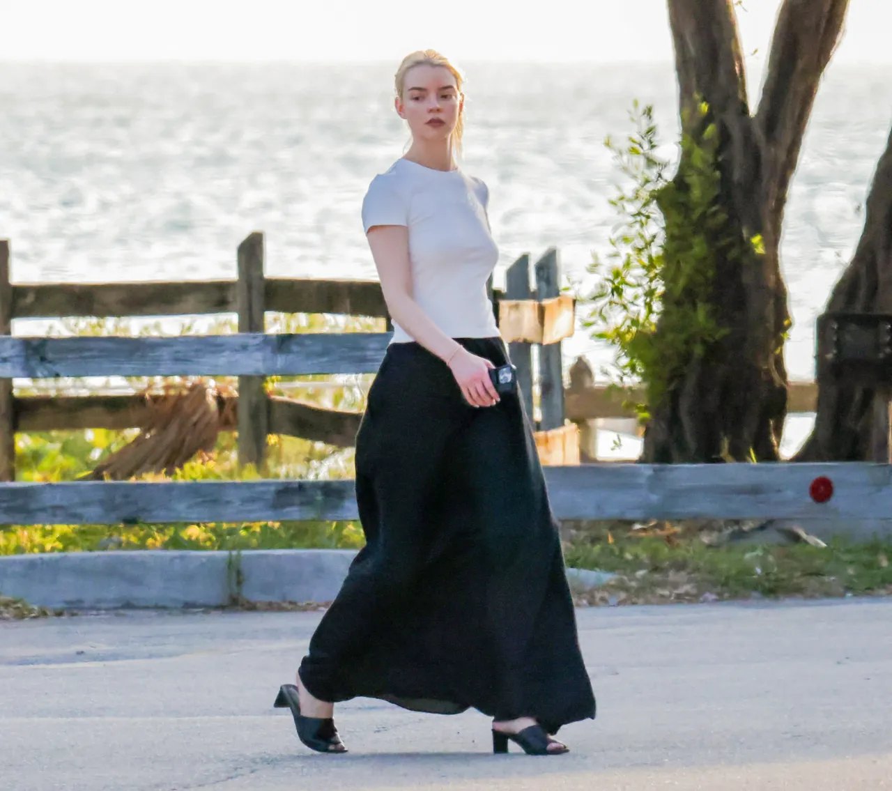 Anya Taylor-Joy in a white T-shirt and black maxi skirt in Key Biscayne, 2026