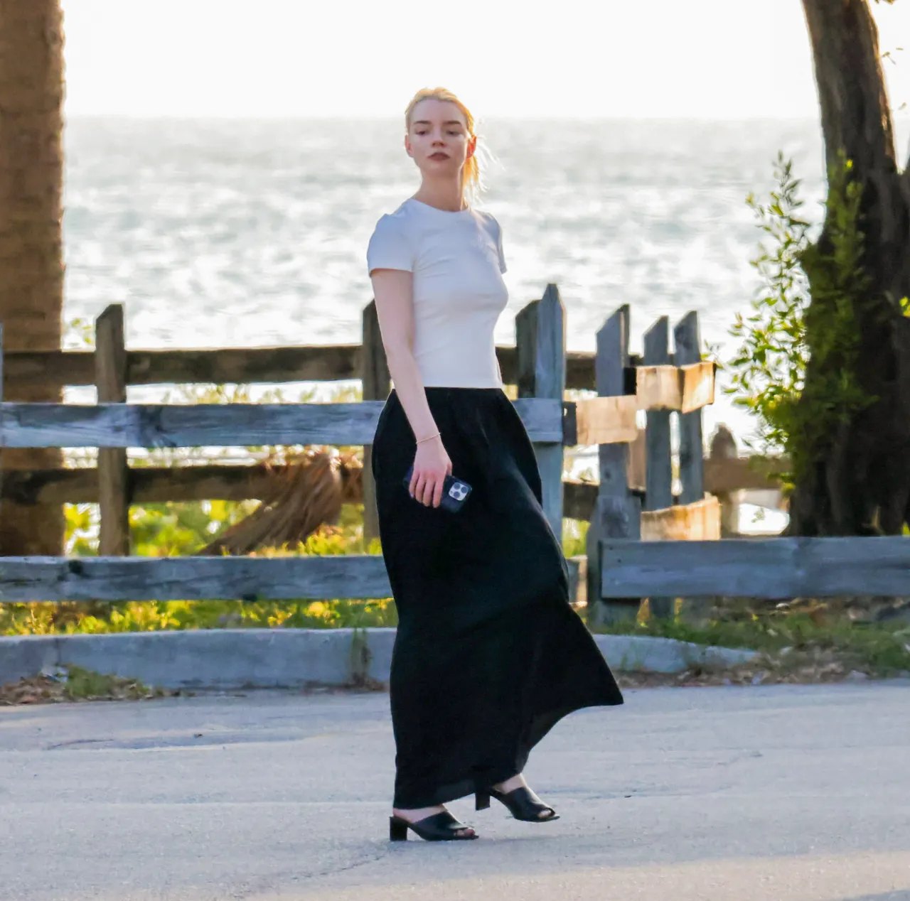 Anya Taylor-Joy in a white T-shirt and black maxi skirt in Key Biscayne, 2026, photo 2