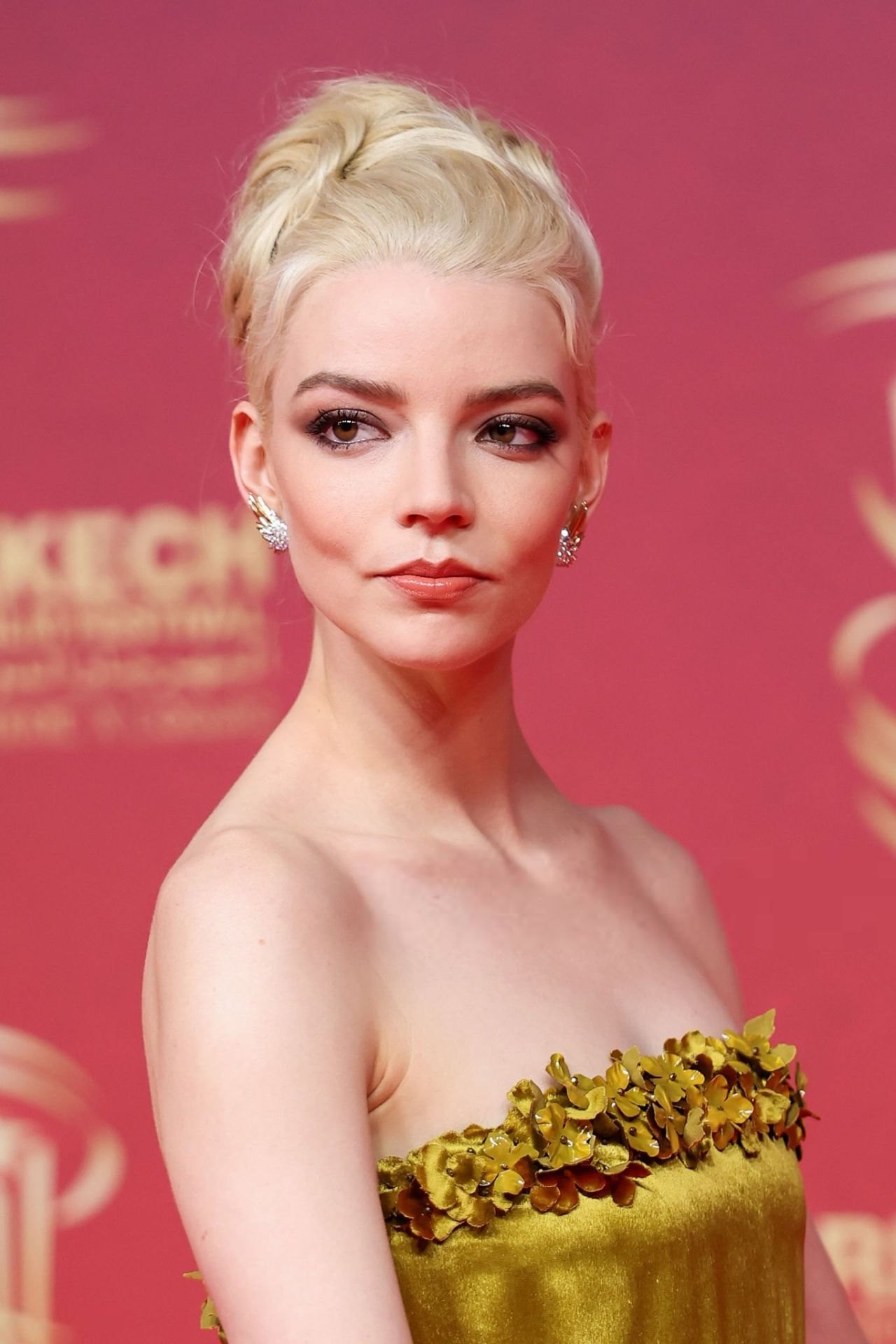 Anya Taylor-Joy in a gold gown at the Marrakech Film Festival, November 2025