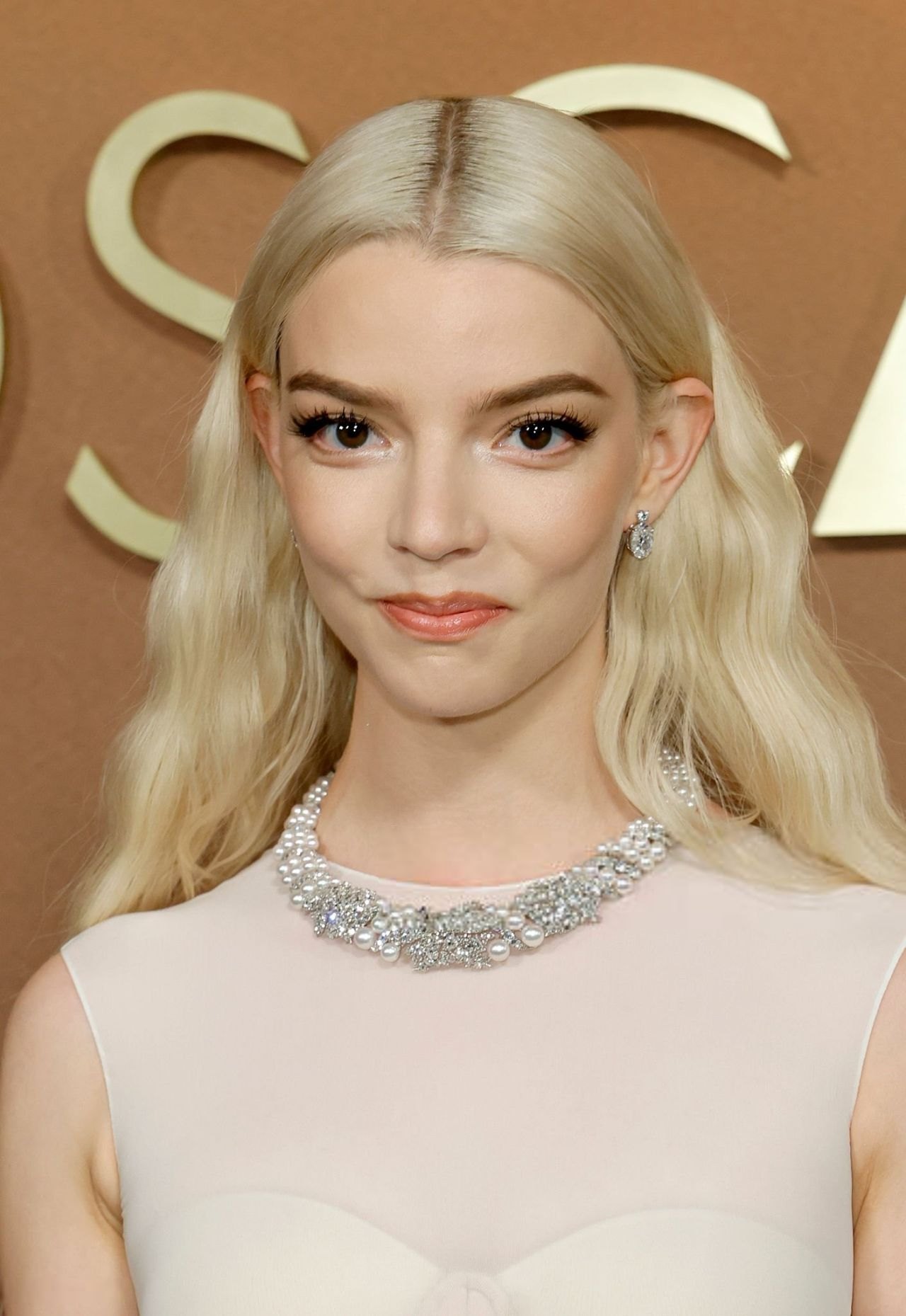 Anya Taylor-Joy in a white caped gown at the Governors Awards, November 2025, photo 3