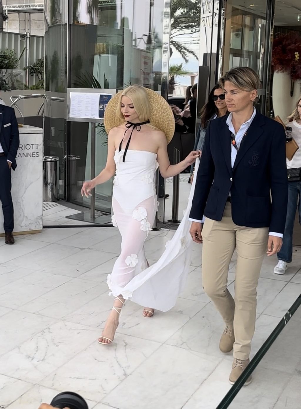 Anya Taylor-Joy in a semi-sheer white strapless dress in Cannes, May 2024, photo 2