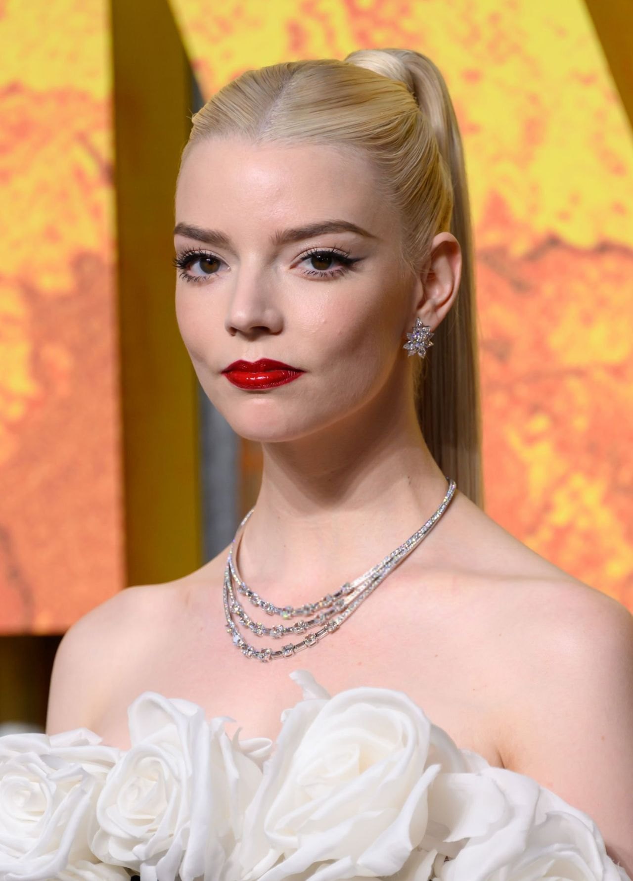 Anya Taylor-Joy in a black bodysuit and white feathers at the Furiosa premiere in London, May 2024, photo 3