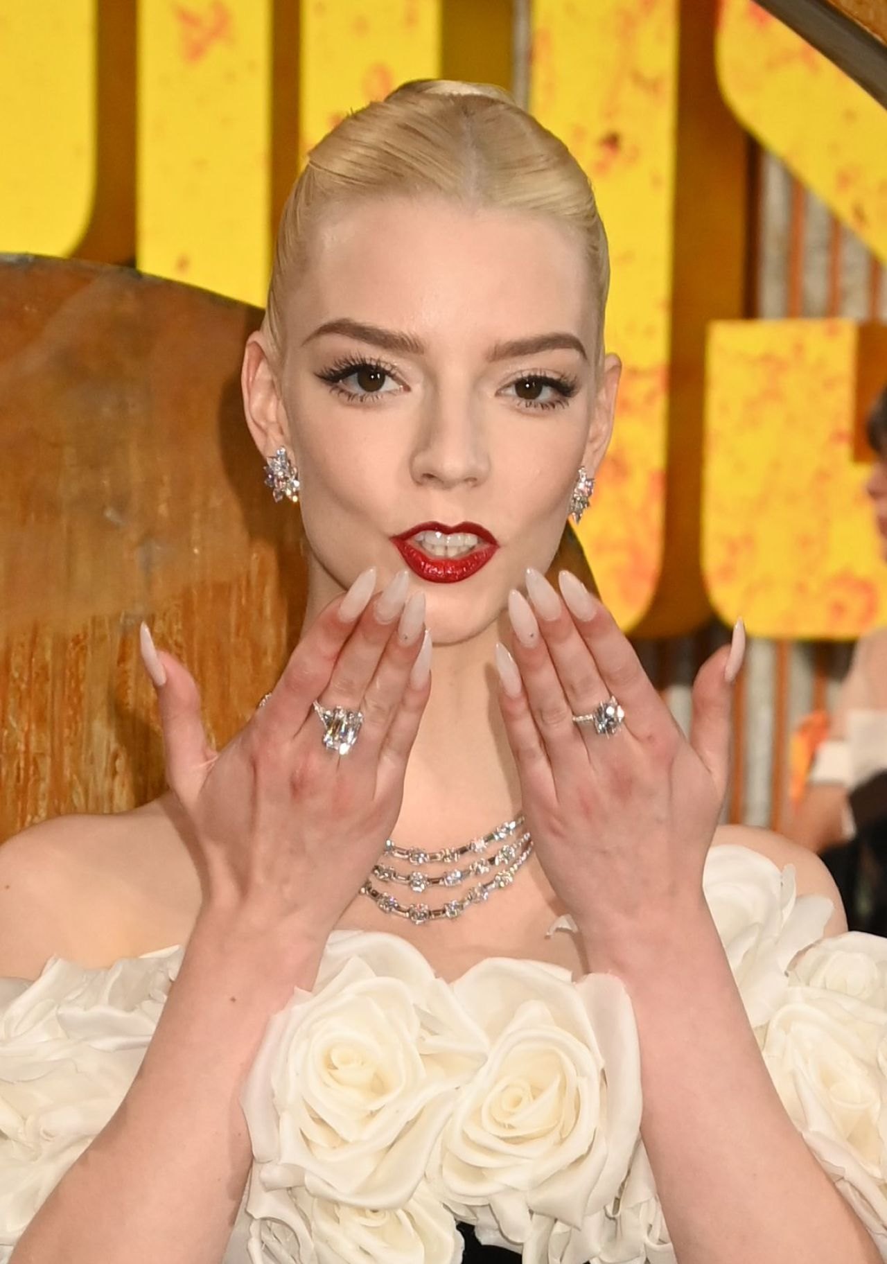 Anya Taylor-Joy in a black bodysuit and white feathers at the Furiosa premiere in London, May 2024, photo 4