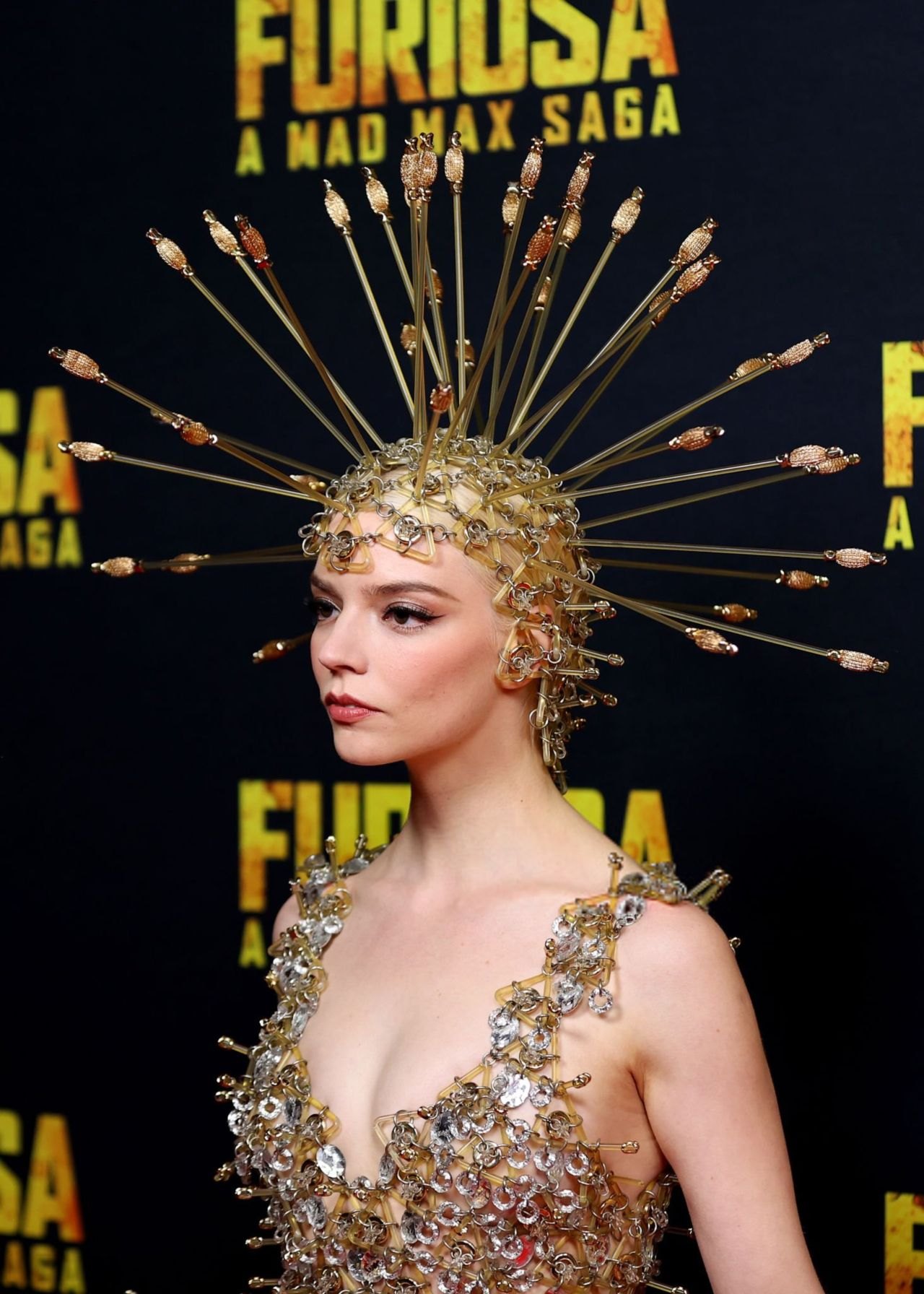 Anya Taylor-Joy in a gold sequin mini dress and headpiece at the Furiosa premiere in Sydney, May 2024, photo 2