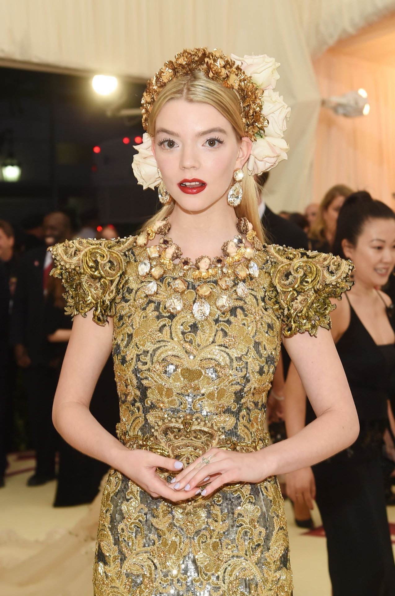 Anya Taylor-Joy in a gold gown and floral crown at the 2018 Met Gala, photo 3