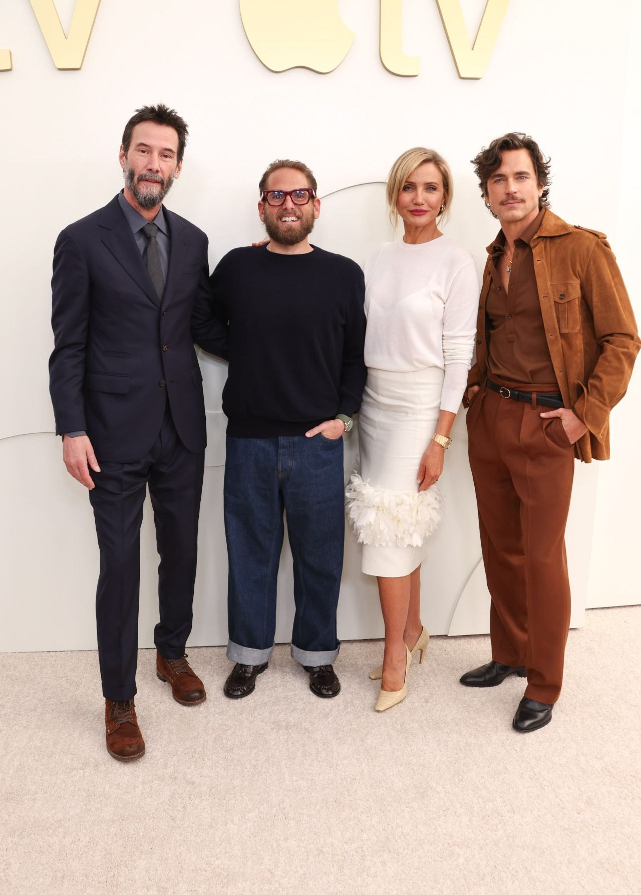 Cameron Diaz at Apple TV press day in a feather-trimmed white look, 2026, photo 3