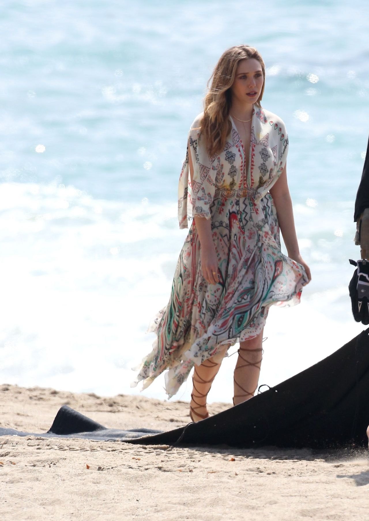 Elizabeth Olsen posing in a floral dress during a Malibu beach photoshoot, March 2015, photo 2