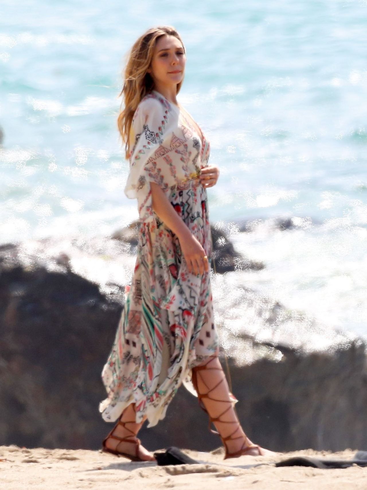 Elizabeth Olsen posing in a floral dress during a Malibu beach photoshoot, March 2015, photo 3
