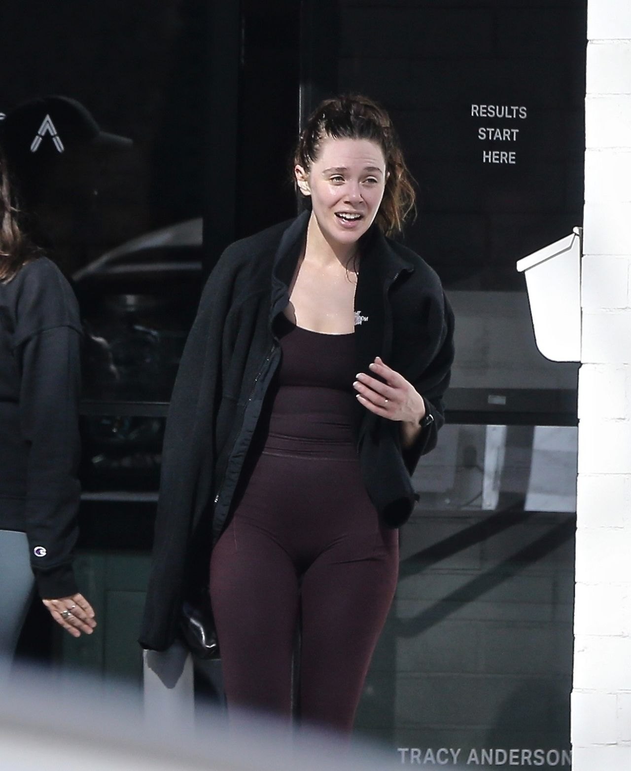 Elizabeth Olsen leaving the gym in a maroon athletic outfit, December 2024, photo 3