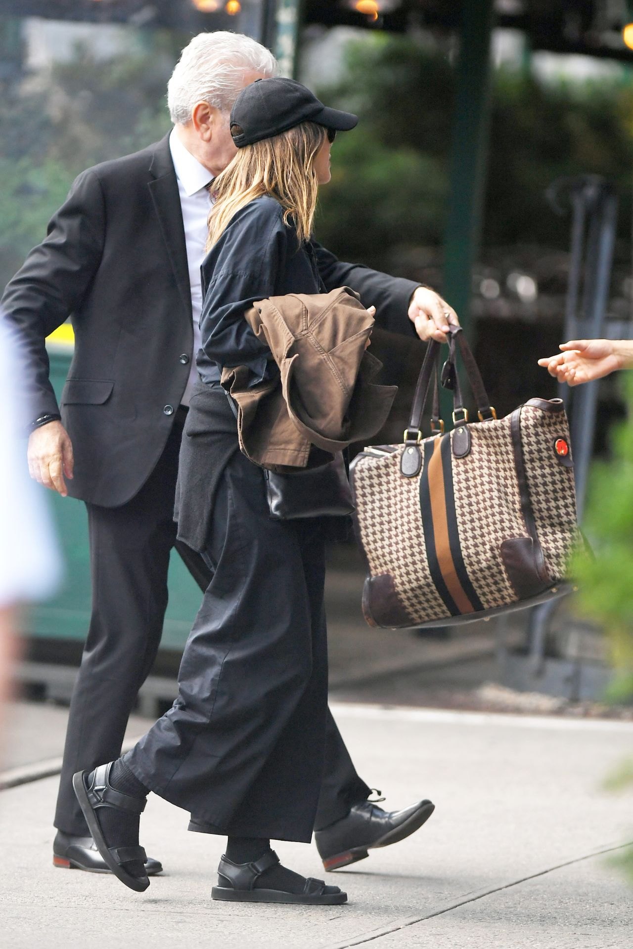 Elizabeth Olsen in a baseball cap out in New York, July 2023, photo 2
