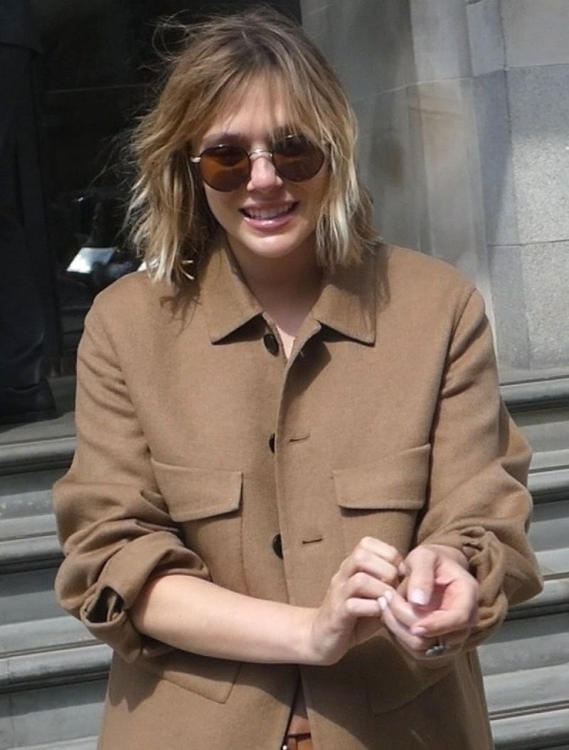 Elizabeth Olsen out in London in a camel jacket, April 2022, photo 3
