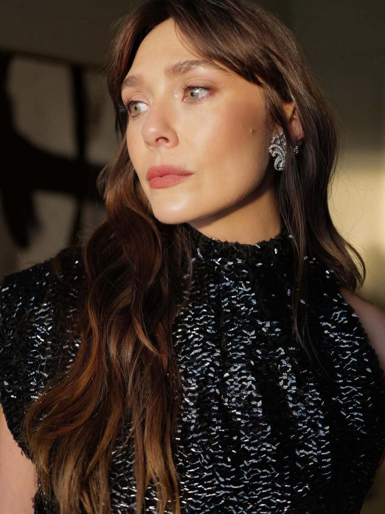 Elizabeth Olsen in a black sequin gown at the Eternity premiere at TIFF, 2025, photo 3