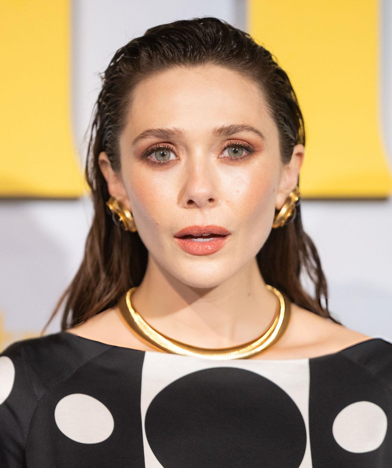 Elizabeth Olsen in a black polka-dot gown at the Eternity UK premiere, 2025, photo 3