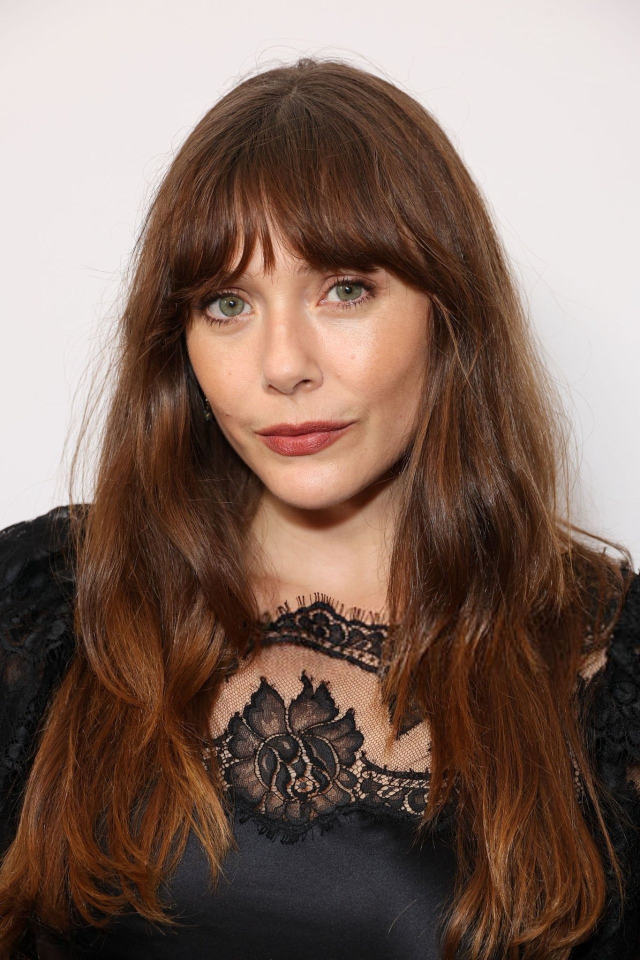 Elizabeth Olsen in a black lace gown at the YES Scholars Gala, 2025, photo 2
