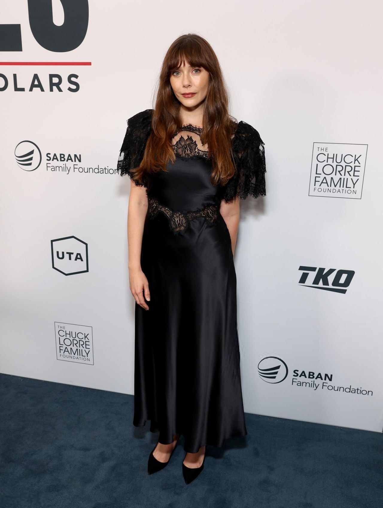 Elizabeth Olsen in a black lace gown at the YES Scholars Gala, 2025, photo 3