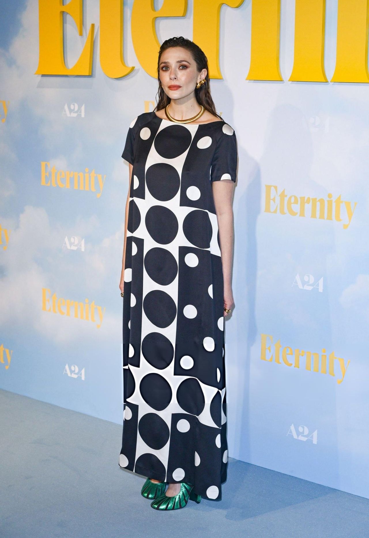Elizabeth Olsen in a black polka-dot gown at the Eternity UK premiere, 2025, photo 4
