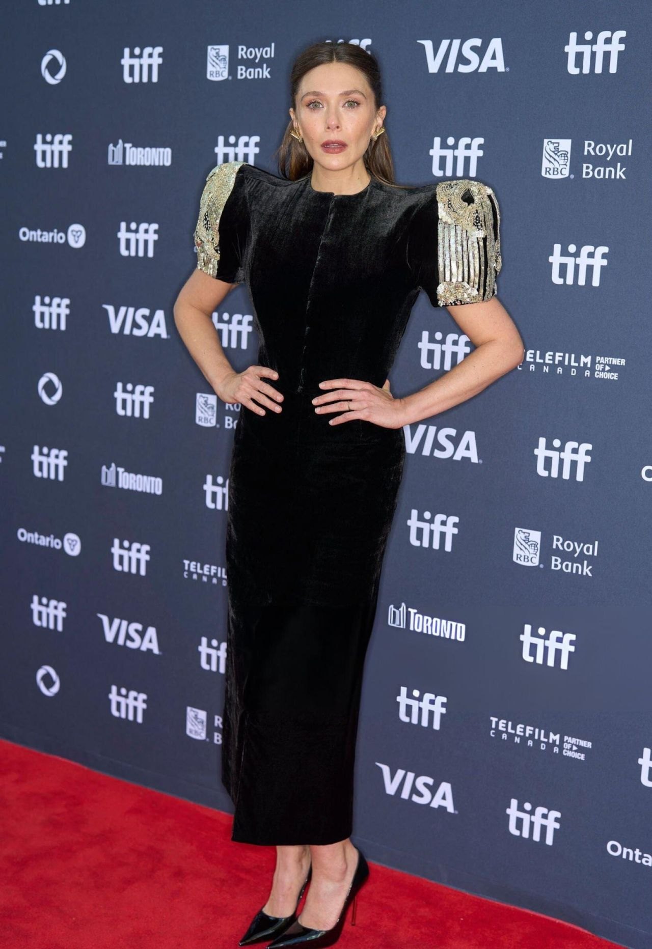 Elizabeth Olsen in a black velvet gown at The Assessment world premiere at TIFF, 2024