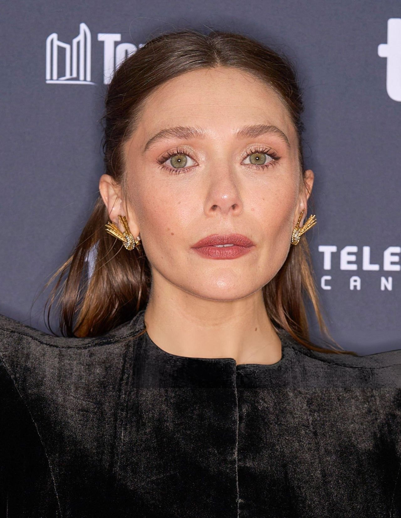 Elizabeth Olsen in a black velvet gown at The Assessment world premiere at TIFF, 2024, photo 3