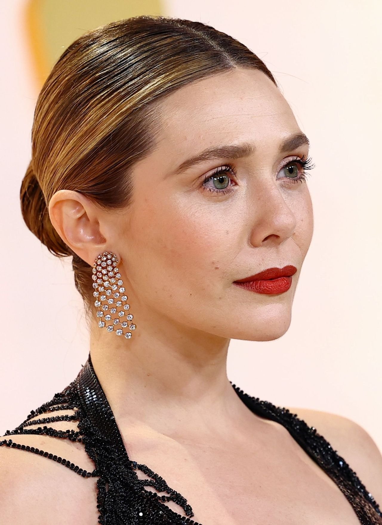 Elizabeth Olsen in a black sequin gown at the 2023 Oscars, photo 3