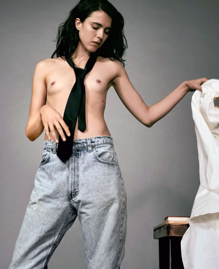 Margaret Qualley topless in jeans with a black tie