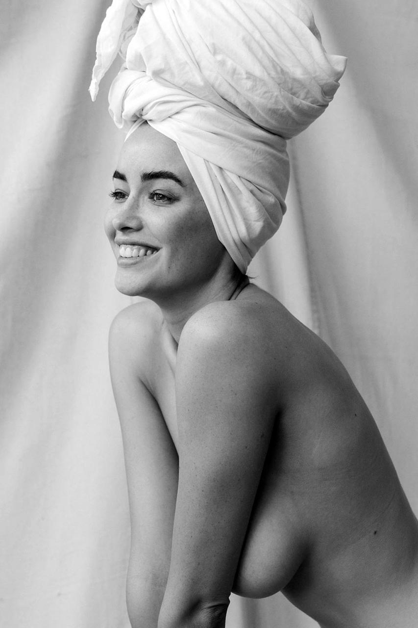 Sarah Stephens nude, towel on her head, smiling over her shoulder